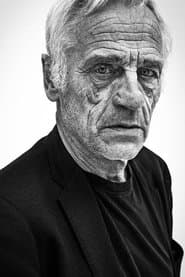 Johan Leysen في دور Frank Schoubya