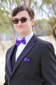 Christopher Lodzinski as Corporate Suit #2