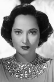 Merle Oberon في دور Karen Wright