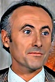 Jean Obé dans le rôle de Botrel, Milan agent