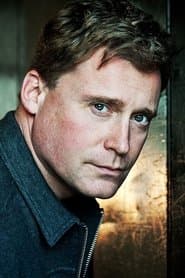 Tim Campbell في دور Frank