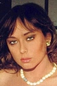 Marcella Petrelli as Pussy Cat, the stripper