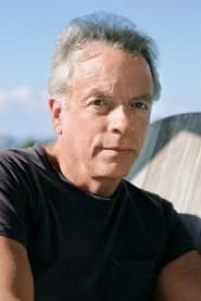 Spalding Gray as U.S. Consul