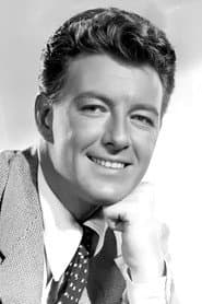 Frederick Brady as Quiz Show MC