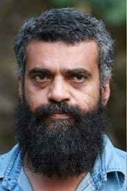 Anil Nedumangad dans le rôle de Satheesh Nair