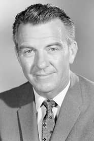 Hugh Beaumont dans le rôle de John Harkness