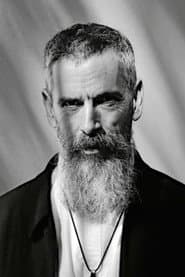 Christopher Chaplin في دور Charles Cros
