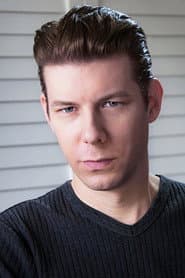 James Byron dans le rôle de Kurt