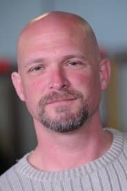 Todd Farmer في دور Security Guard