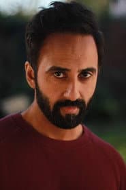 Arjun Singh Panam as Roy Kennedy