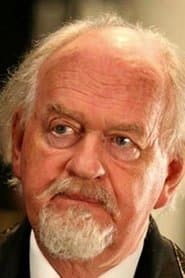 Neville Phillips في دور Minister