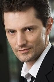 John Emmet Tracy as Detective Dolor