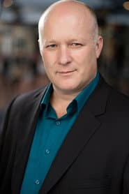 Chris Nowland في دور Security Guard