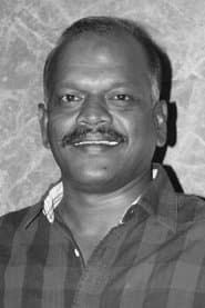 R. Velraj dans le rôle de Cameo