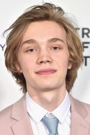 Charlie Plummer as T.J.