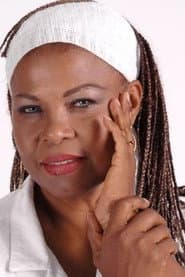 Veronika Con K. في دور Sister Caridad