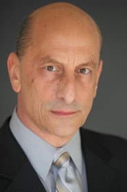 Emilio Palame dans le rôle de Mr. Truman
