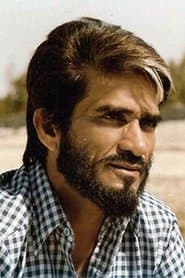 Mac Mohan dans le rôle de Mac