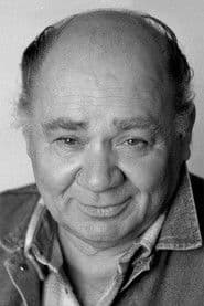 Evgeni Leonov as Embassy employee in Austria