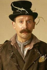 John D. Collins dans le rôle de Student