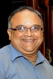 Mohan Raman في دور Pitambar Jalan's PA Sheshadri