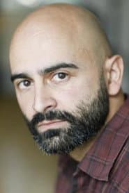 Olivier Prémel في دور Zeroual's Goon #3