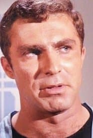 Garth Pillsbury dans le rôle de Tom Palmer