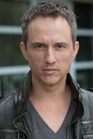 Daniel Arnold في دور Priest