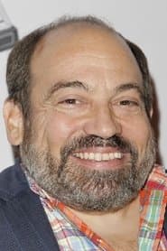 Danny Woodburn as Arni