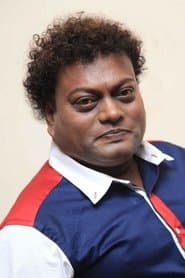 Sadhu Kokila في دور Lucky