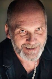 Bill Croft dans le rôle de Motorcycle Policeman