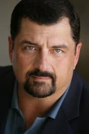 Carl Ciarfalio dans le rôle de Barner