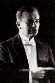 William Welsh dans le rôle de Warden