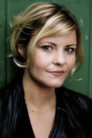 Tara Lynne O'Neill في دور Tracy Milligan