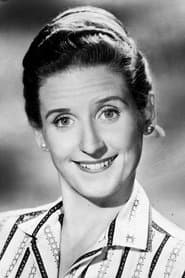 Ann B. Davis as Millie, Carol's Secretary