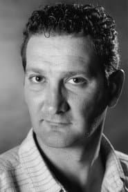 Frédéric Restagno dans le rôle de The Police Commissioner