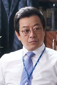 Lee Ki-young dans le rôle de Mr. Kim