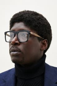 Alassane Sy as Abas