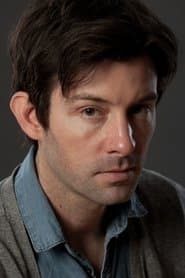 Shane Carruth as Aaron